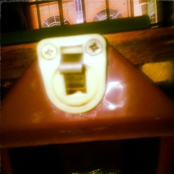 This Rather Shocked Bottle Opener Behind A Bar