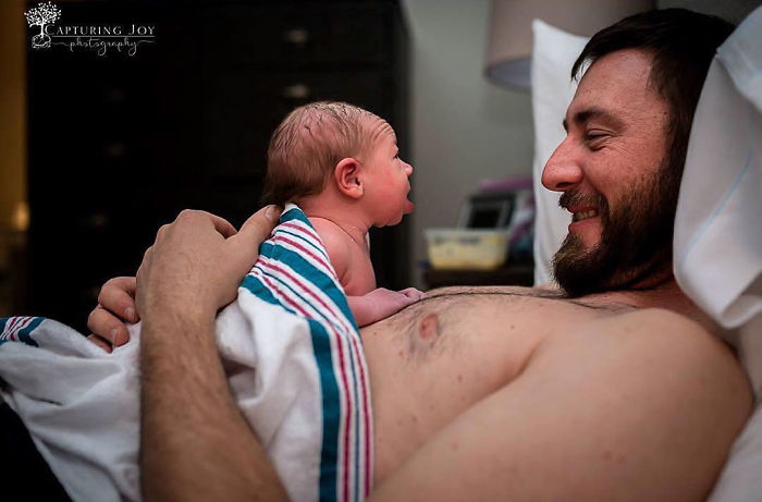 Wow. Hours Old And Already Lifting Her Head Up High To Get A Good Look At Her Daddy!