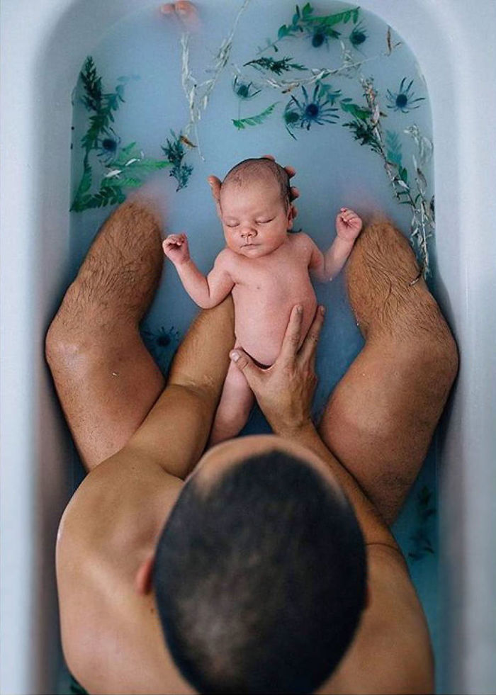 Father And Son In A Flower Milk Bath. Daddy Was So Proud To Do This With His Son. It Was So Touching!