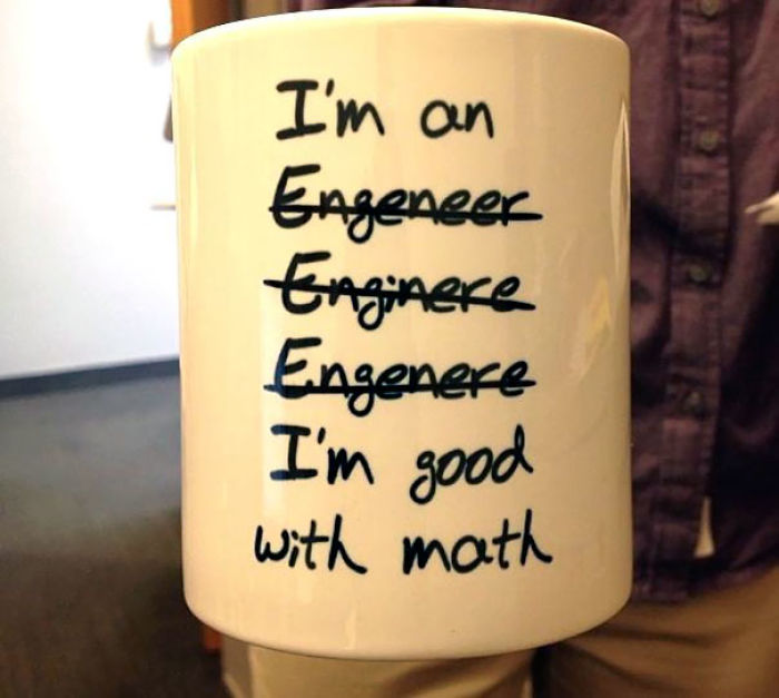 Mug with humorous text about spelling errors related to engineers, highlighting witty wives.