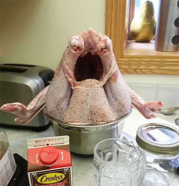 Raw chicken posed in a funny way resembling a screaming figure, an example of pareidolia in everyday objects.