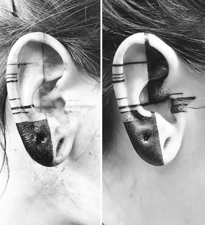Black and white helix tattoo design on ear showcasing the latest tattoo trend.
