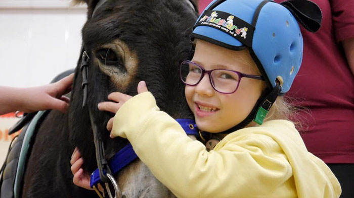 therapy-donkey-helps-girl-speak-amber-3 therapy-donkey-helps-girl-speak-amber-3