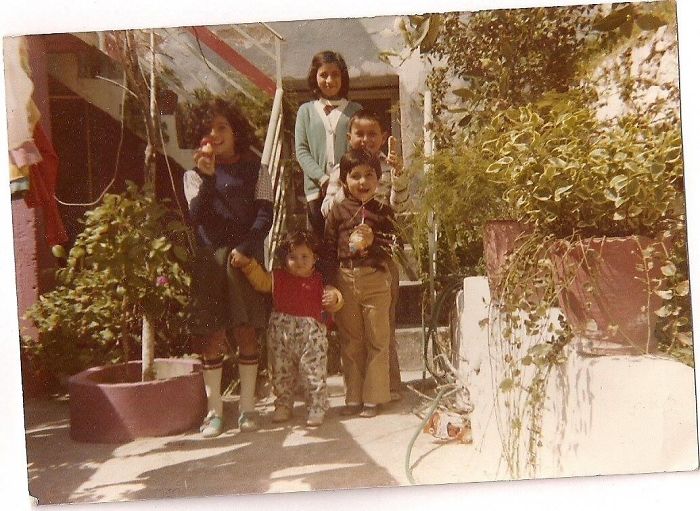 My Mom In Early 80's On The Stairs With My Aunts And Uncle (white Shirt)