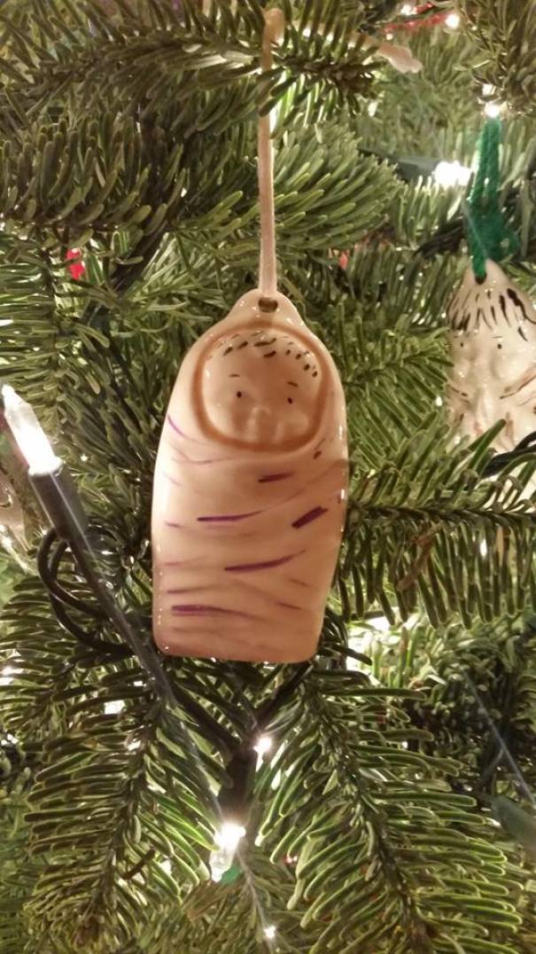 Baby Jesus/severed Thumb Christmas Ornament