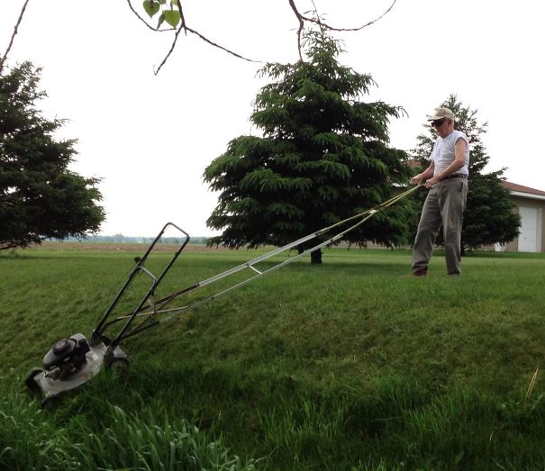 I Present To You, My Badass 91 Year Old Grandpa Mowing His Ditch Banks With His Mower Handle Extender