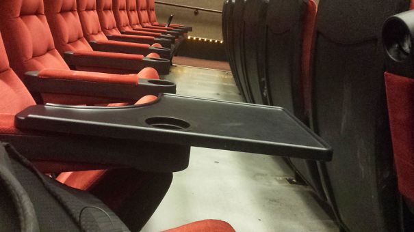 My University Has Classes In A Movie Theatre And We Have Desks That Fit Into The Cupholders