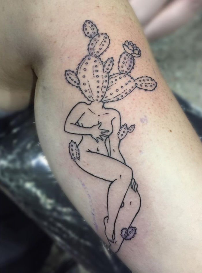 Tattoo of a headless girl with a cactus head on an arm, art by Molly Jean.