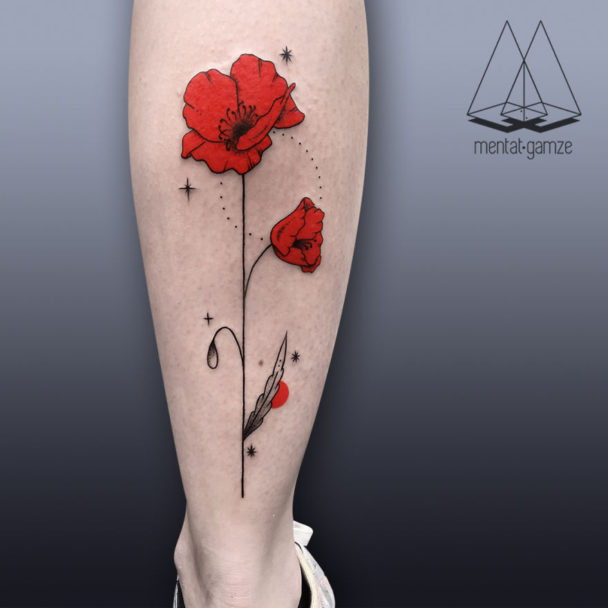 Red poppy tattoo design on leg, featuring intricate lines and dots, by a tattoo artist.