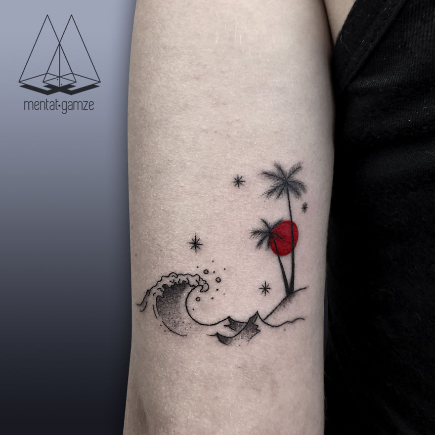 Tattoo of a wave, palm trees, and red sun on arm, representing a creative journey from a boring job to tattoo artistry.