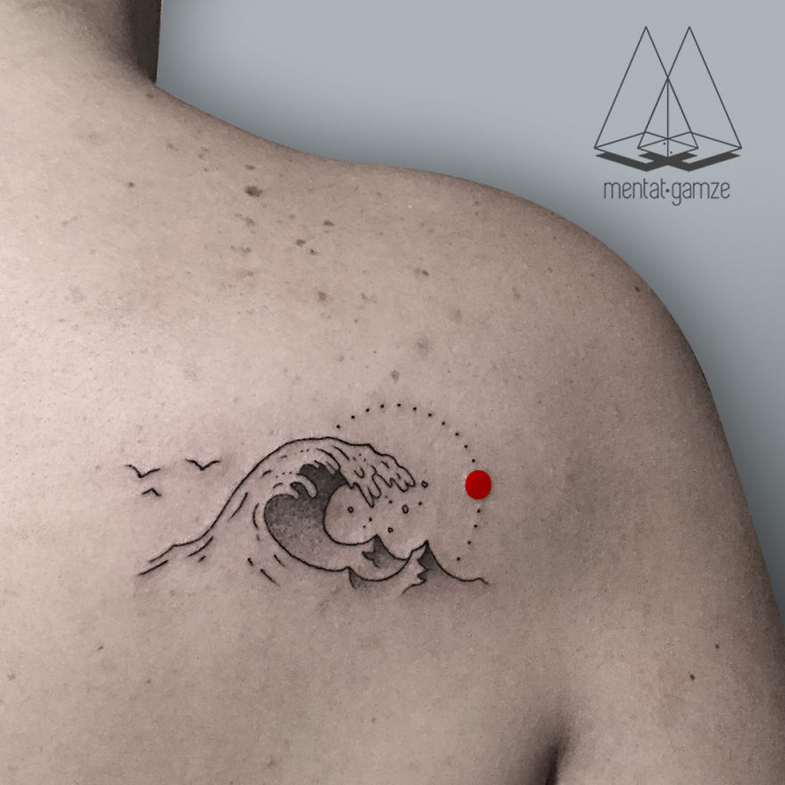 Minimalist tattoo of a wave with a red dot on a shoulder, showcasing a new tattoo artist's work.