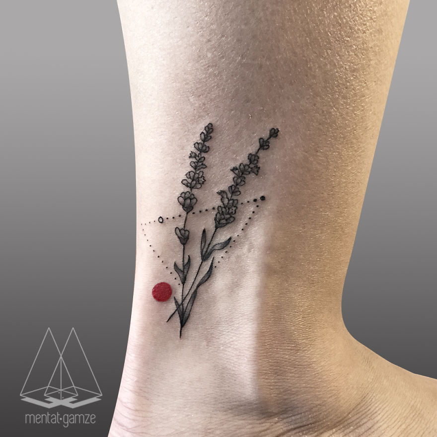 Minimalist tattoo with lavender and a red dot on the ankle, symbolizing a journey to become a tattoo artist.