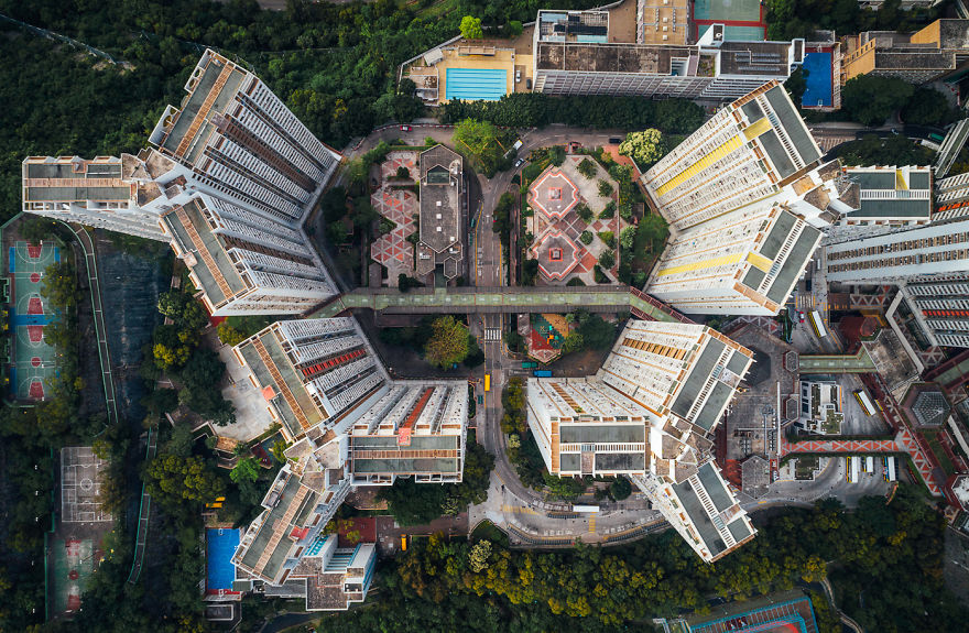 Aerial view of densely packed residential buildings depicting claustrophobic living conditions in Hong Kong.