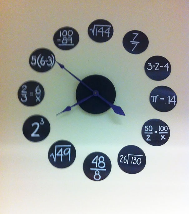 Creative school clock featuring math problems in place of traditional numbers.