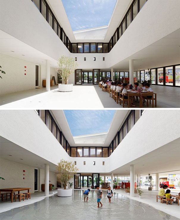 Modern school design with an open courtyard, featuring tables and water play area, ideal for creative activities.