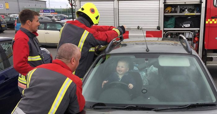 Toddler Can’t Stop Laughing After Locking Himself In Car While 5 Firefighters Try To Rescue Him