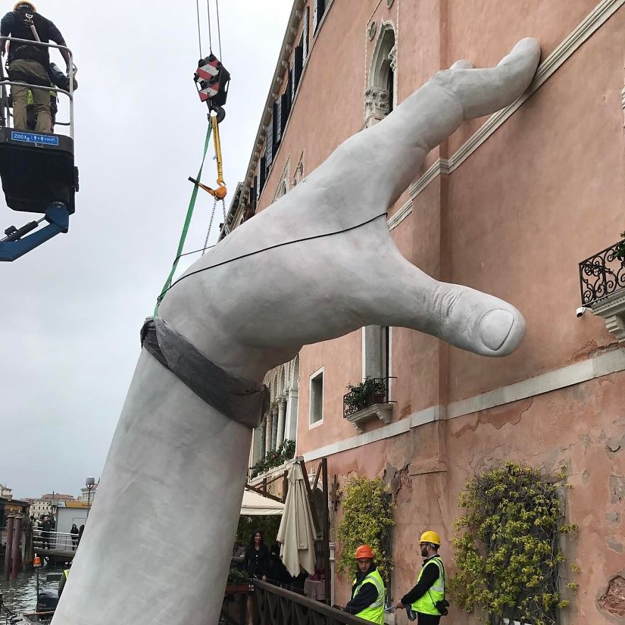 Support: Giant Hands Rise From A Canal In Venice To Send A Powerful Message About Climate Change Support: Giant Hands Rise From A Canal In Venice To Send A Powerful Message About Climate Change