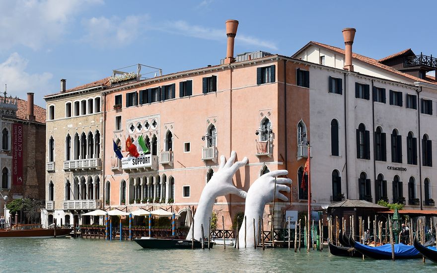 Support: Giant Hands Rise From A Canal In Venice To Send A Powerful Message About Climate Change Support: Giant Hands Rise From A Canal In Venice To Send A Powerful Message About Climate Change