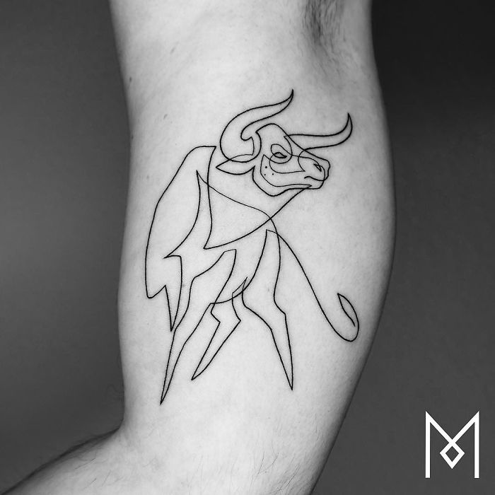 Single continuous line tattoo of a bull by Mo Ganji on an arm.