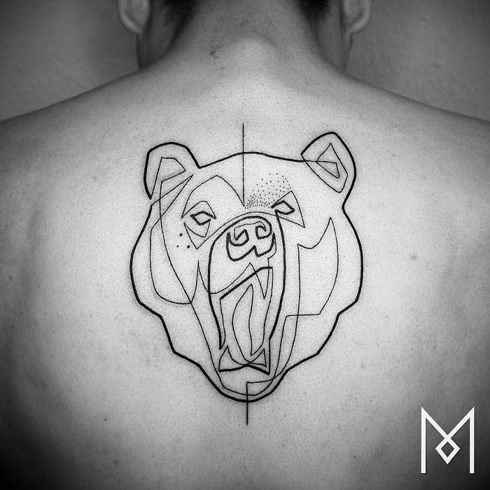 Single line bear tattoo by Mo Ganji, on a person's back.