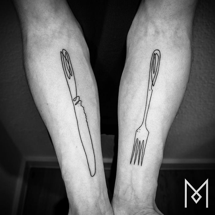 Single line tattoos of a knife and fork on forearms by Mo Ganji.