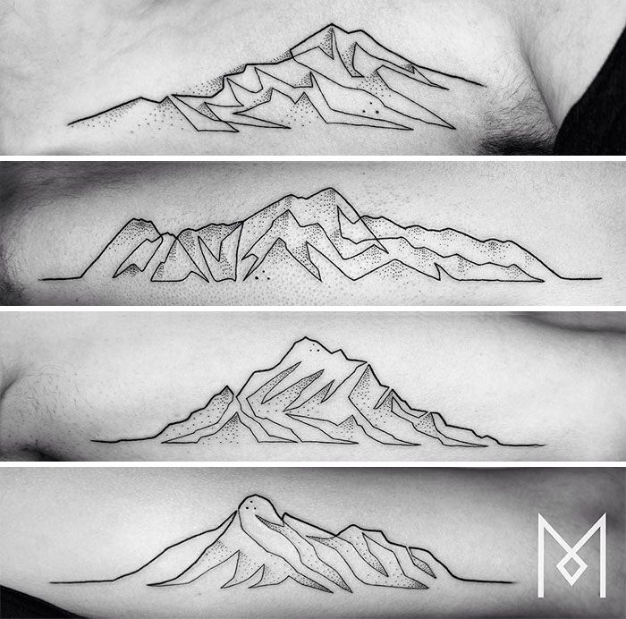 Single continuous line mountain tattoos by Mo Ganji, showcasing intricate minimalist designs on forearms.