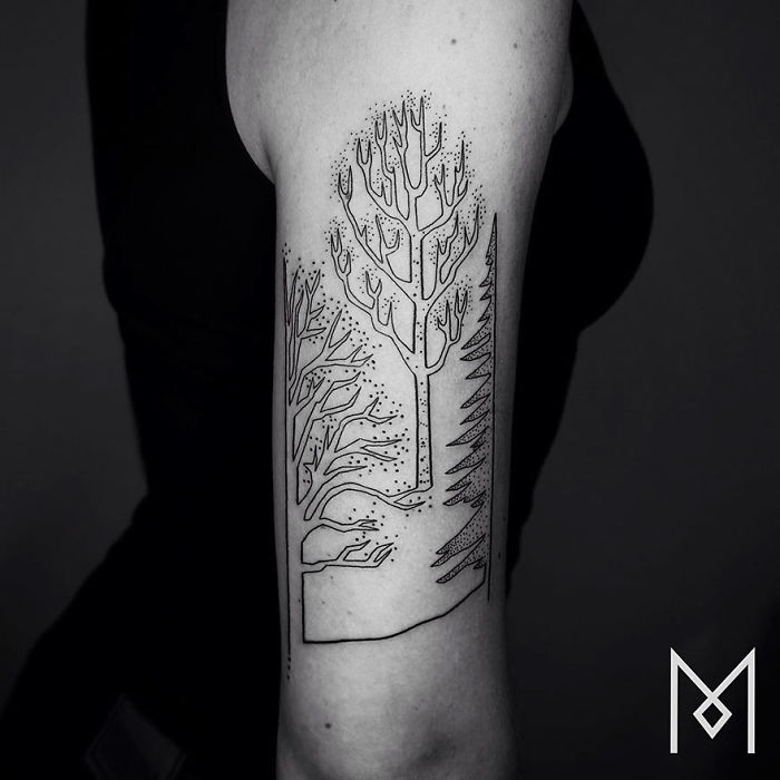 Single continuous line tattoo of trees on arm by Mo Ganji.