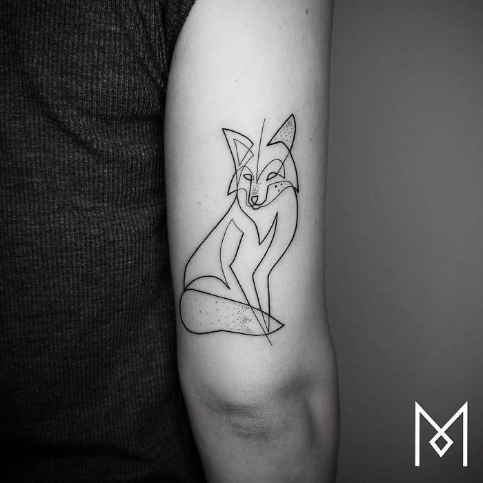 Single continuous line tattoo of a fox on an arm by Mo Ganji.