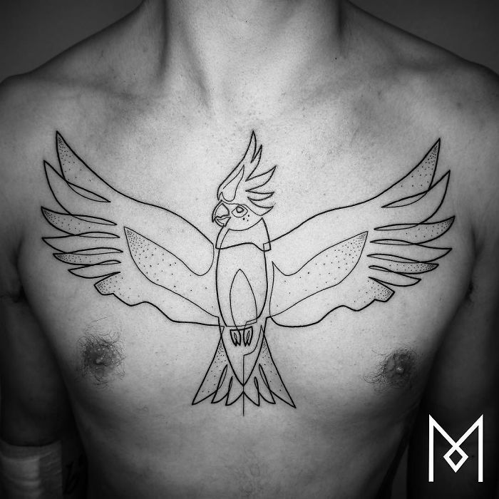 Single continuous line tattoo of a bird on a person's chest by Mo Ganji.