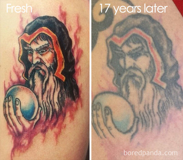 Tattoo showing aging process over 17 years, with a wizard holding an orb, colors faded and lines blurred.