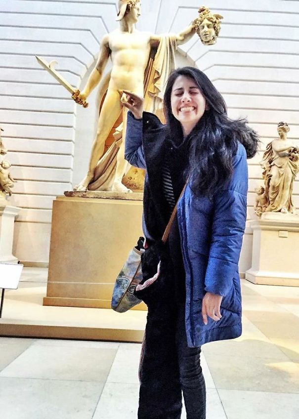 People Playing With Statues