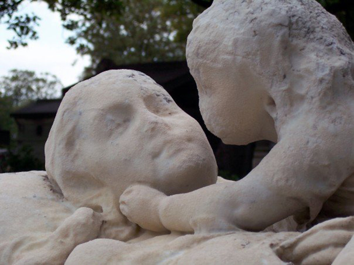 Daughter Says Farewell To Her Mother Forever At Père Lachaise Cemetery In Paris.