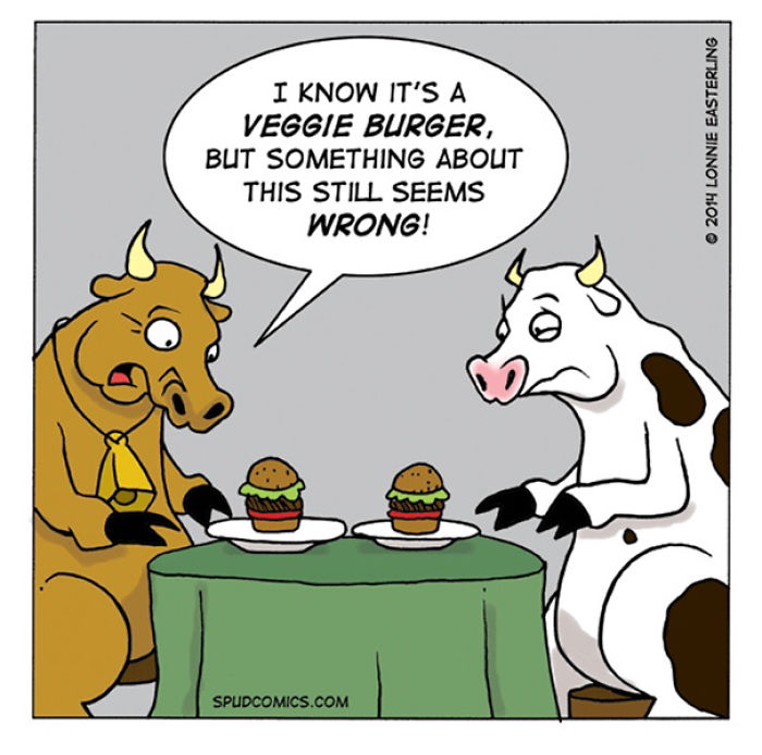 Two cows sit at a table with veggie burgers, one saying something feels wrong in this funny comic strip by Spud Comics.