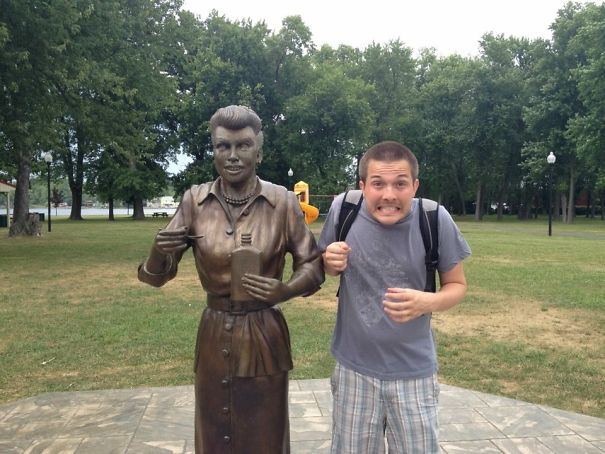 People Playing With Statues