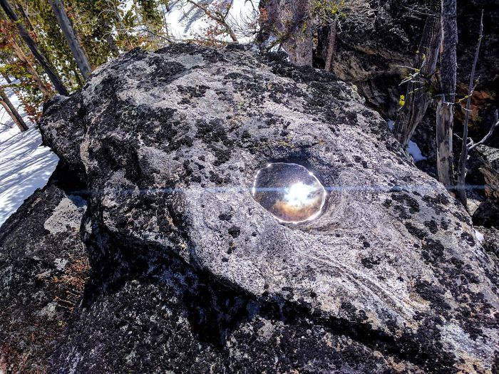 This Puddle Reflecting The Sun Looks Like A Portal To Space