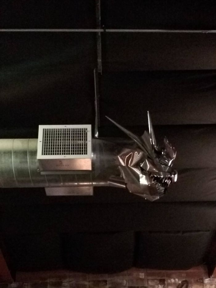 The Local Bar Sculpted The Vent Into A Dragon