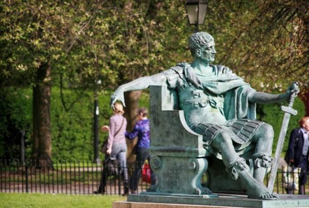 People Playing With Statues