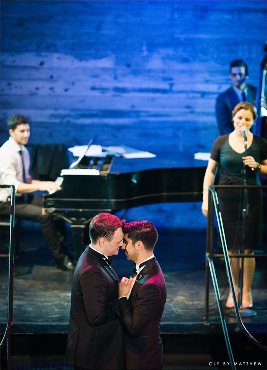 Two men looking at each other on stage 