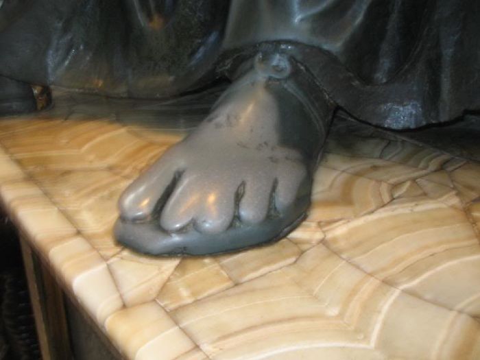St Peter's Foot In St Peters Cathedral In Rome. Worn Out By Centuries Of Devotion