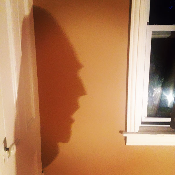 This Shirt Hanging On A Chair Casts A Face-Like Shadow