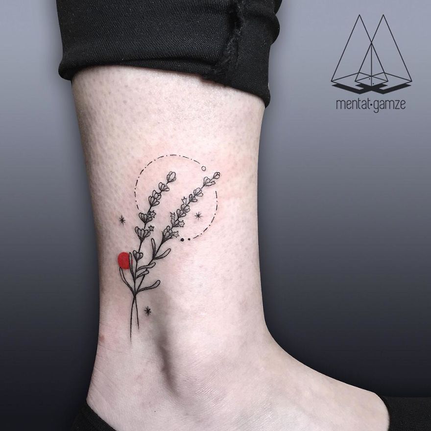 Delicate botanical ankle tattoo with a red dot, symbolizing a new career in tattoo art.