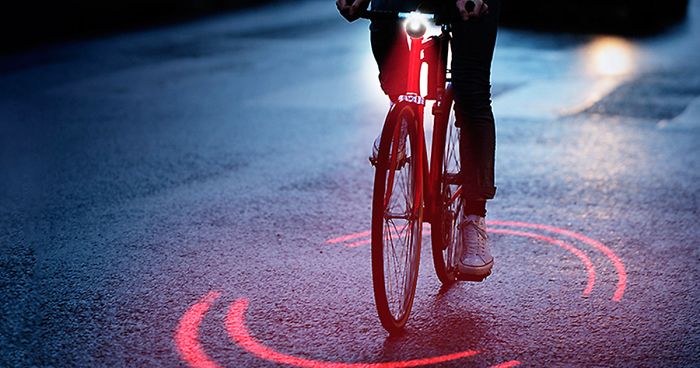 Michelin Just Made A Bike Lighting System That Protects Cyclists From Traffic Inside Its Ring Of Red Light