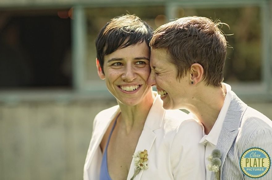 Two happy women hugging 