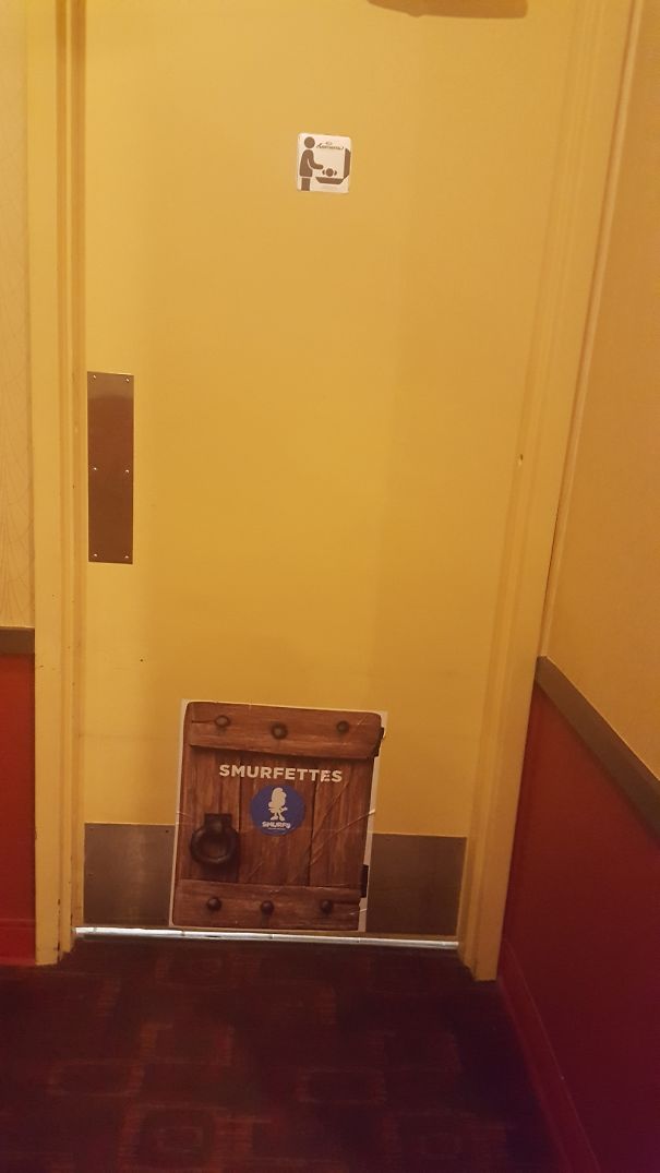 This Smurfettes Sign On The Wo