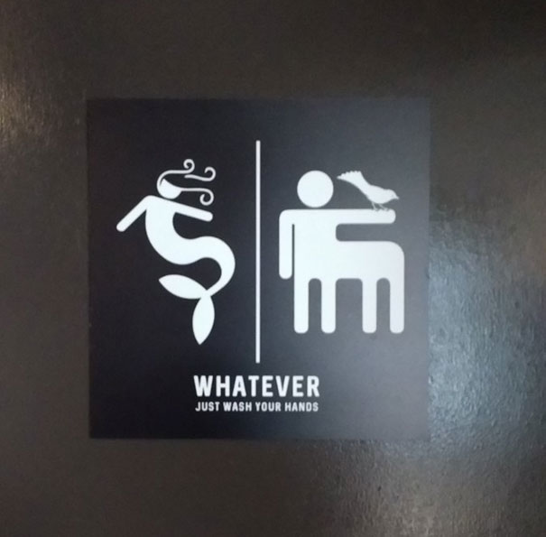 Funny bathroom sign with mermaid and centaur images, captioned "Whatever Just Wash Your Hands."