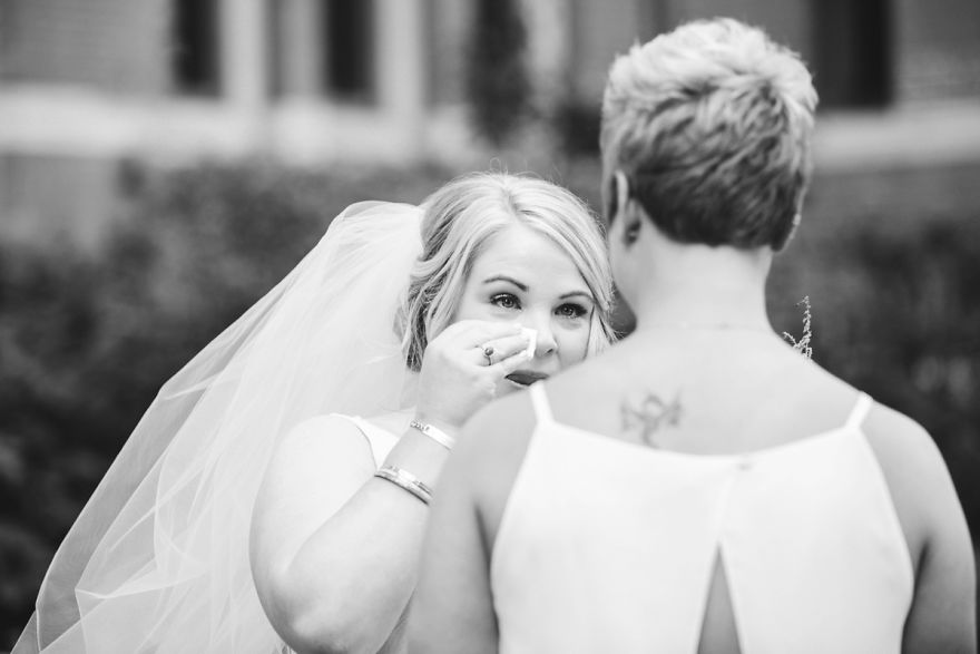 Two happy women hugging and crying 