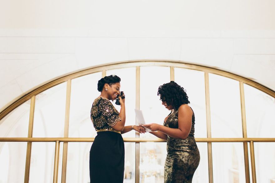 Two women smiling and crying 