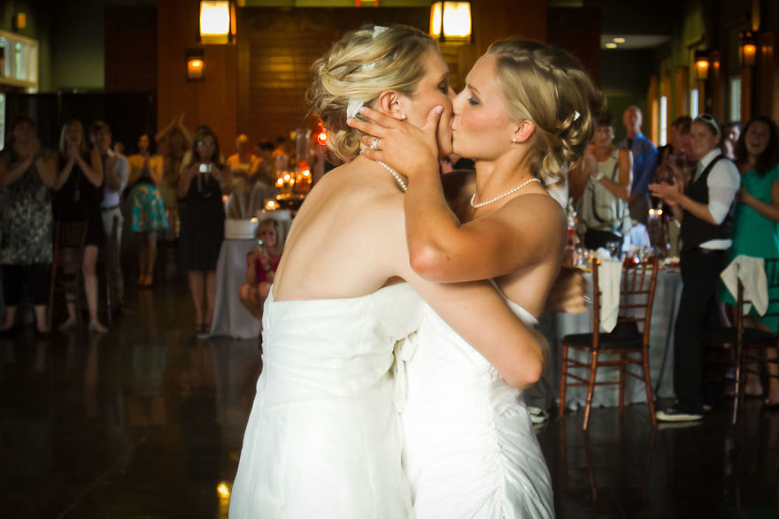 Two women kissing and hugging 