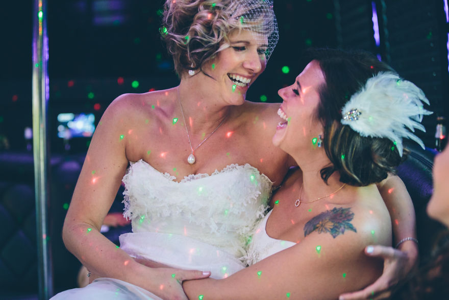 Two woman hugging and laughing 