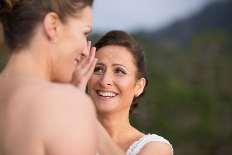 Two happy women crying 